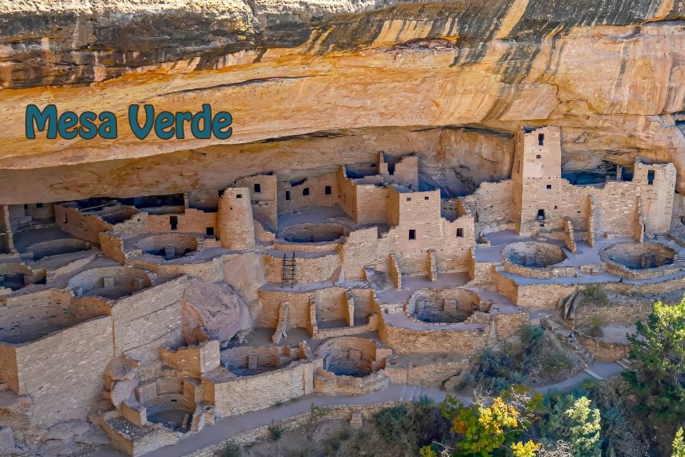 Wide view of Mesa Verde cliff dwellings showing ancient Pueblo ruins, a family friendly spring break destination that connects kids to America’s history